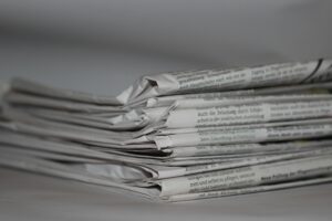 Decorative image of a stack of newspapers.